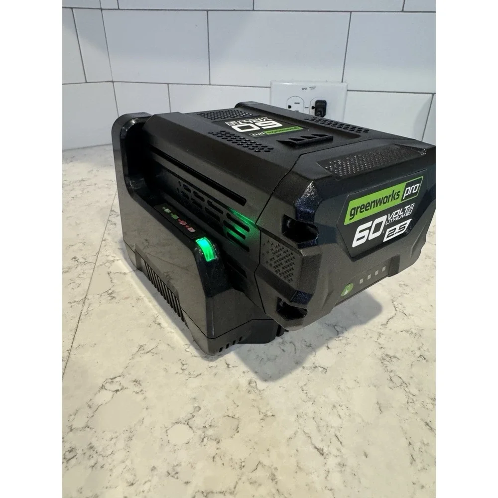 Greenworks Pro 60v Lithium Li-Ion 2.5 Battery  & Charger.  Charges FULL